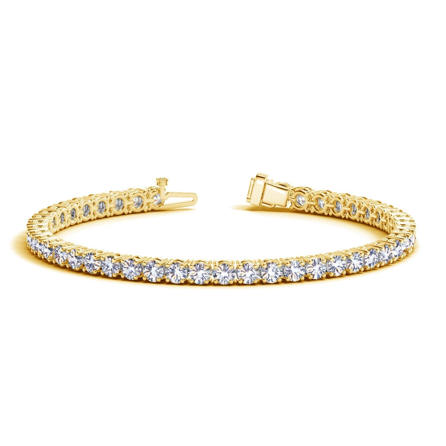 Lab-grown diamond jewelry flat lay on black velvet — princess cut solitaire ring, yellow gold diamond tennis bracelet, and white gold diamond heart pendant necklace with brilliant diamond sparkle