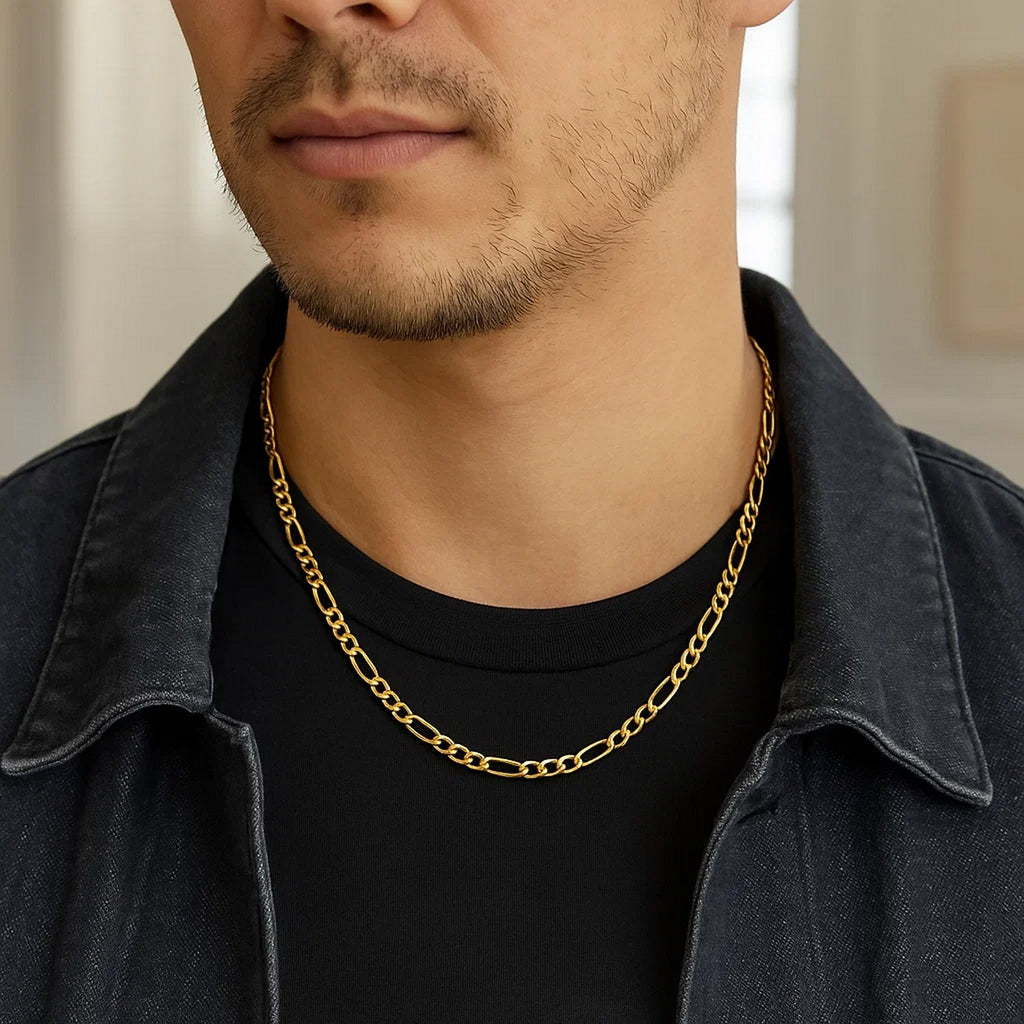 14K yellow gold solid Figaro chain, 3.80mm, shown on a man’s neck to display real‑life fit, shine, and solid gold craftsmanship.