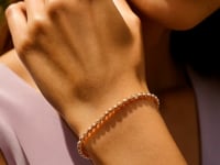 14K Rose Gold Diamond Cut Stretchable Moon Cut Bead Bracelet (3.00 mm)